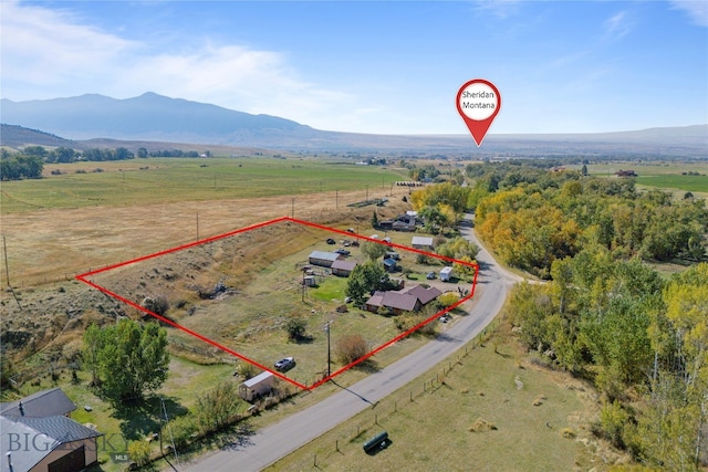 bird's eye view featuring a mountain view and a rural view