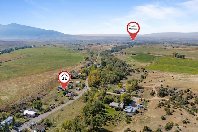 aerial view with a mountain view and a rural view