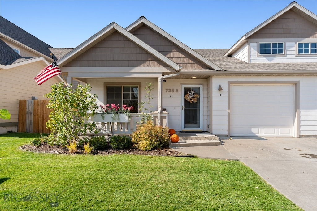 view of front of home with a porch and a front lawn