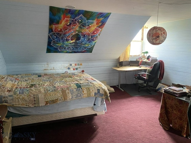 bedroom featuring vaulted ceiling and carpet