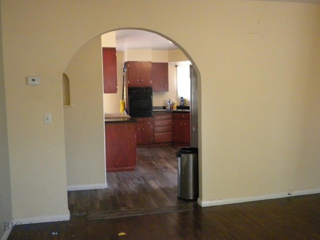 hall featuring dark hardwood / wood-style floors