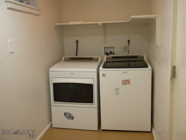 laundry area featuring washer and clothes dryer