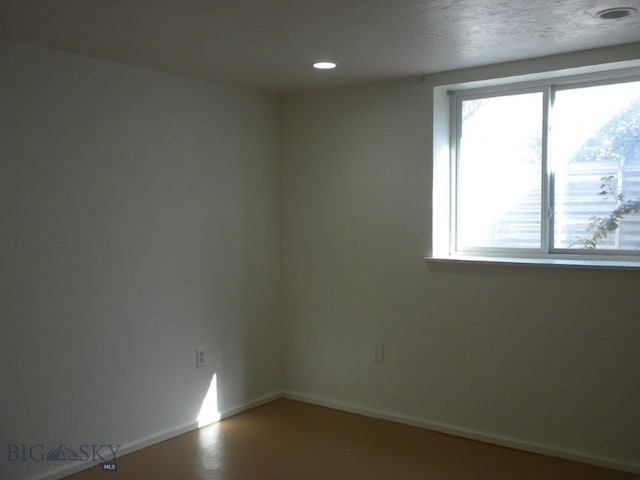 unfurnished room featuring a healthy amount of sunlight