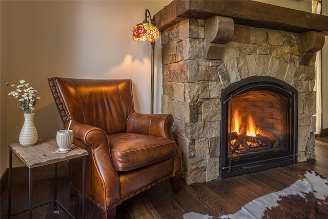 2250 Outlook Trl, Big Sky, MT 59716 - living area featuring a fireplace and wood finished floors
