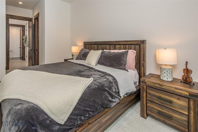 2250 Outlook Trl, Big Sky, MT 59716 - bedroom with wood finished floors and recessed lighting