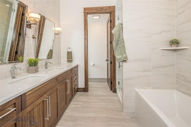 2250 Outlook Trl, Big Sky, MT 59716 - bathroom with a freestanding tub, double vanity, and a stall shower