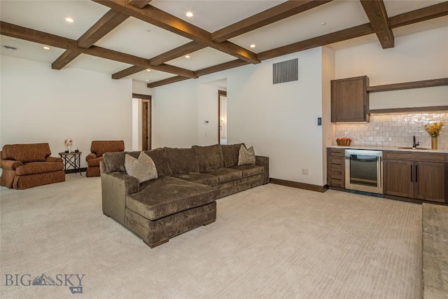 2250 Outlook Trl, Big Sky, MT 59716 - living room featuring coffered ceiling, light carpet, beamed ceiling, wet bar, and recessed lighting