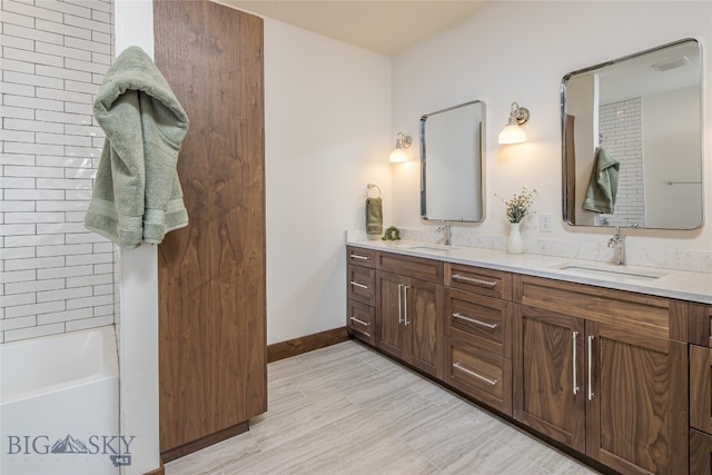 bathroom featuring vanity and hardwood / wood-style floors