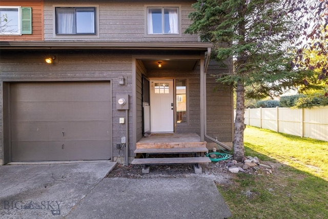 property entrance with a garage