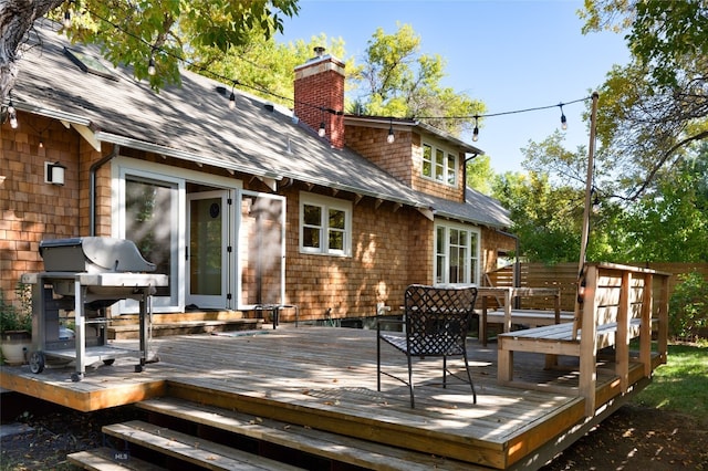 wooden terrace with grilling area