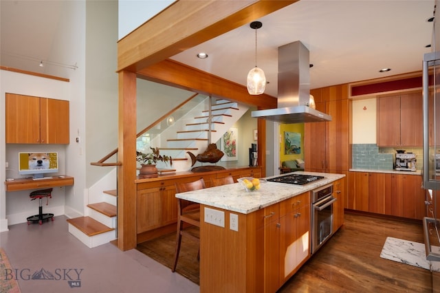 kitchen with island range hood, dark hardwood / wood-style floors, stainless steel appliances, hanging light fixtures, and a center island