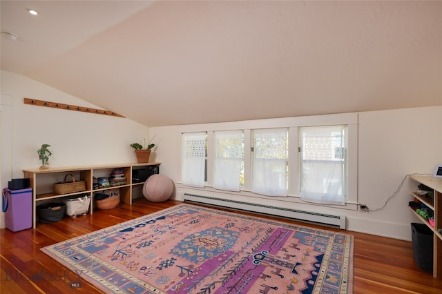 living area featuring lofted ceiling, dark hardwood / wood-style floors, and a baseboard radiator