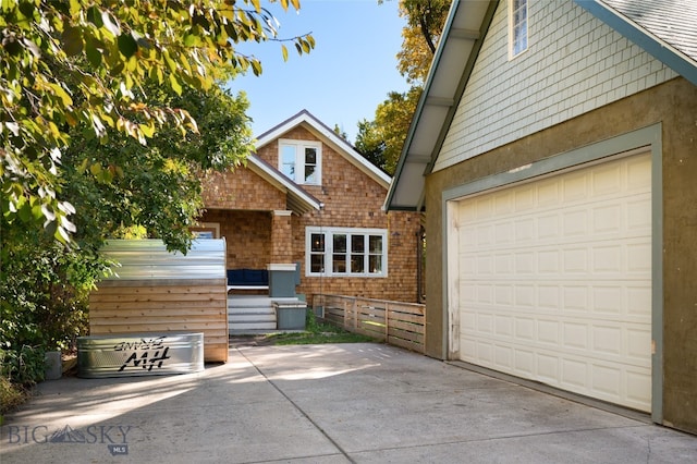 exterior space with a garage