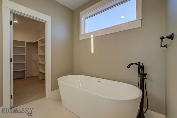 bathroom featuring a tub