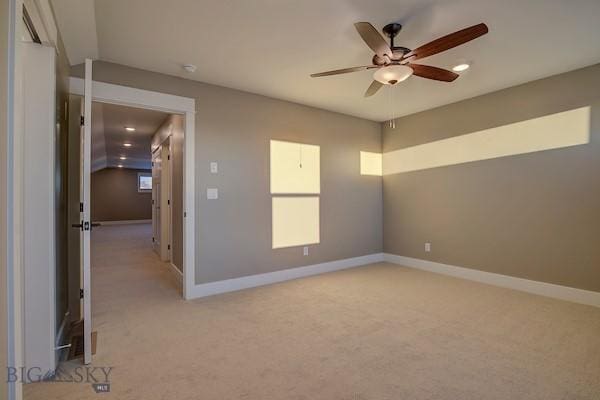 unfurnished bedroom with light carpet and ceiling fan