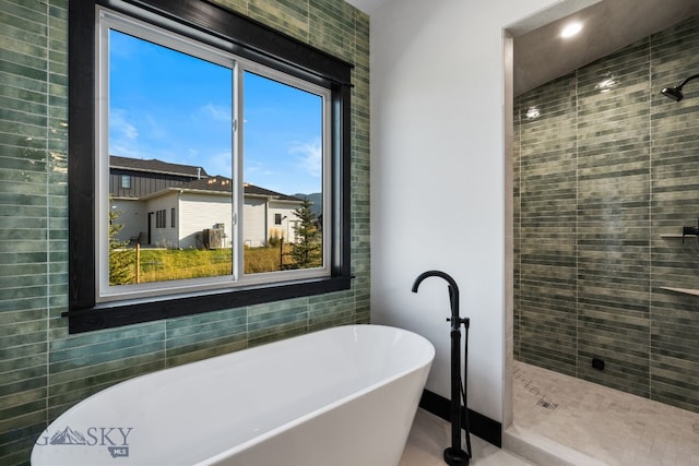 119 Clancy Way, Bozeman, MT 59718 - bathroom with a freestanding bath, a shower stall, and recessed lighting
