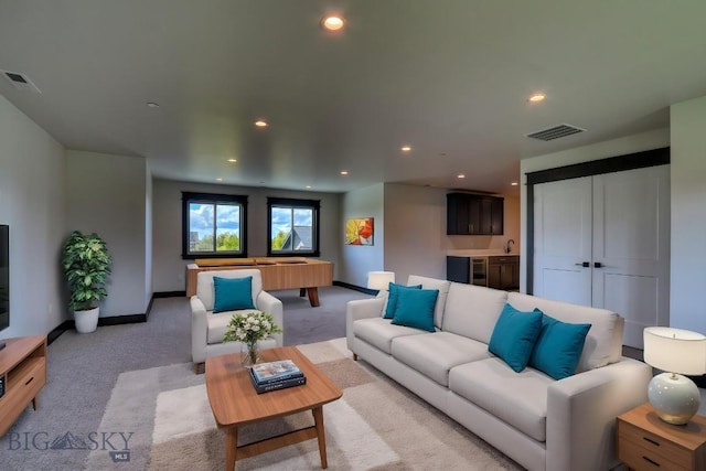 119 Clancy Way, Bozeman, MT 59718 - living room featuring light carpet, recessed lighting, and baseboards