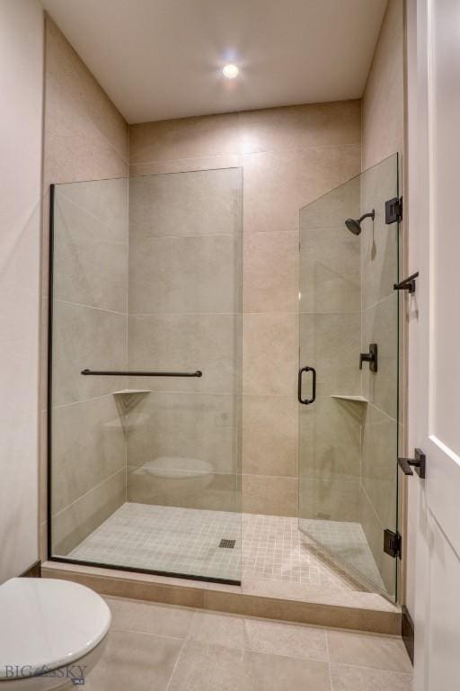 119 Clancy Way, Bozeman, MT 59718 - full bath featuring toilet, a stall shower, recessed lighting, and tile patterned flooring