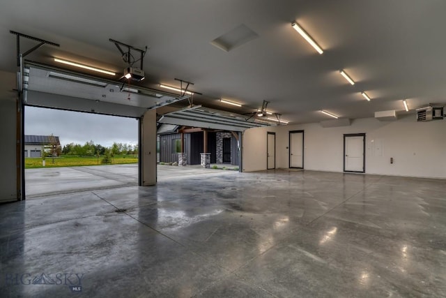 119 Clancy Way, Bozeman, MT 59718 - garage featuring a garage door opener