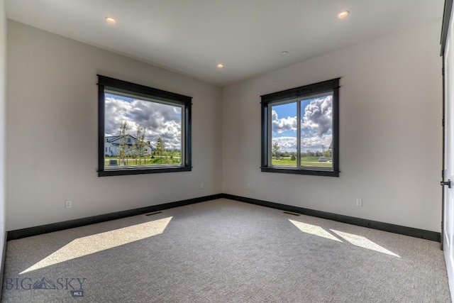 119 Clancy Way, Bozeman, MT 59718 - carpeted spare room with baseboards and recessed lighting
