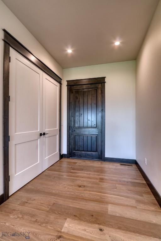 119 Clancy Way, Bozeman, MT 59718 - entrance foyer featuring baseboards, light wood finished floors, and recessed lighting