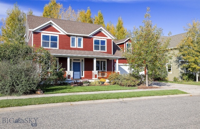 view of front of home featuring a porch and a front yard