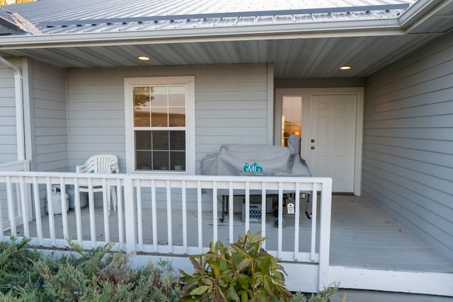 entrance to property with a deck