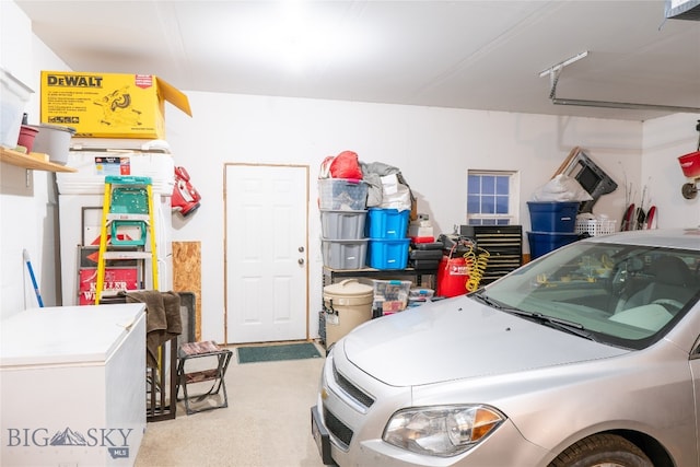 garage with white refrigerator