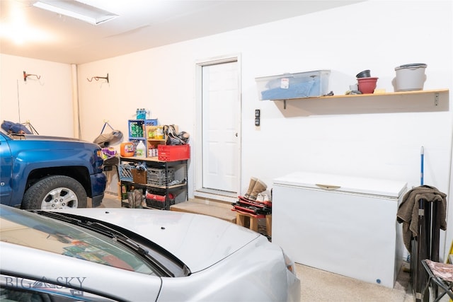 garage with fridge