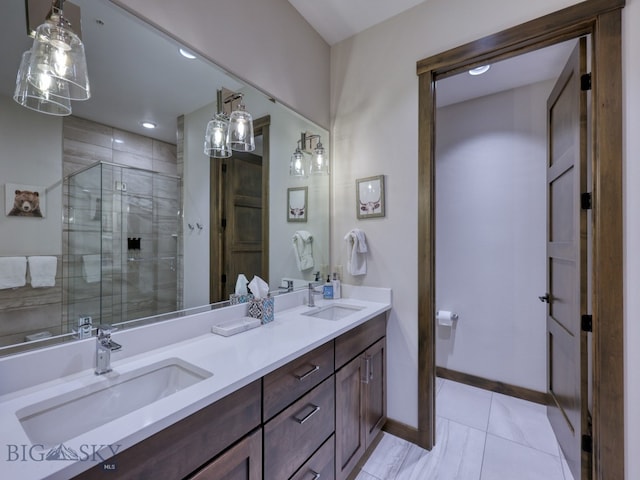 bathroom featuring vanity, tile patterned floors, and an enclosed shower