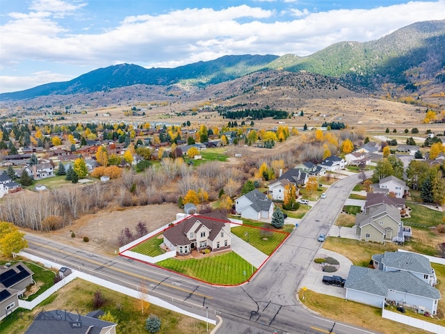 drone / aerial view featuring a mountain view