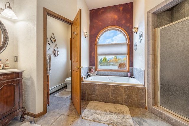 full bathroom with tile patterned floors, toilet, baseboard heating, independent shower and bath, and vanity