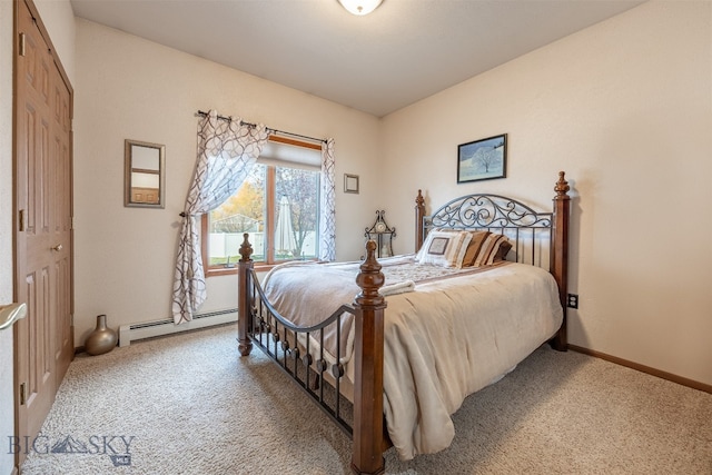 bedroom featuring a closet, carpet flooring, and a baseboard radiator