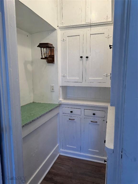 1705 Wall, Butte, MT 59701 - bar area featuring dark wood-style floors and baseboards