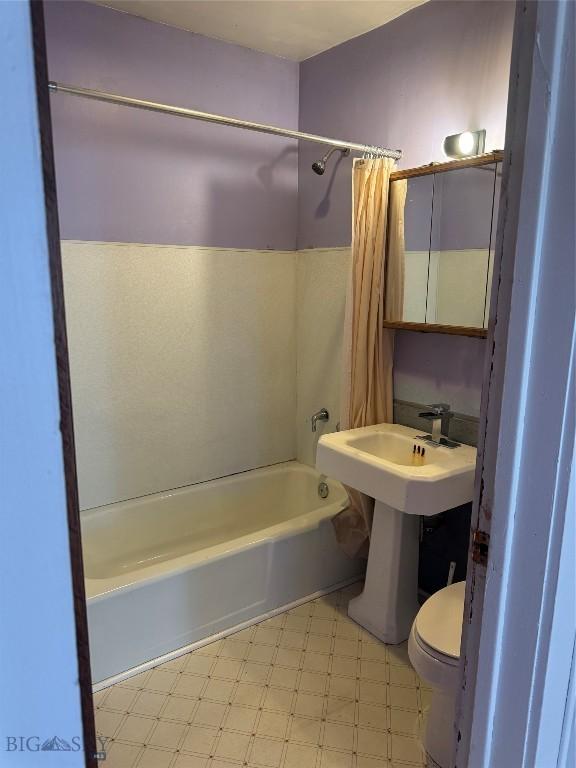 1705 Wall, Butte, MT 59701 - bathroom with tile patterned floors and shower / bath combination with curtain