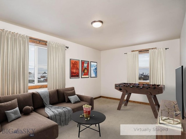 living room featuring light carpet