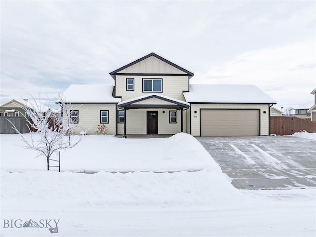 view of front of property with a garage