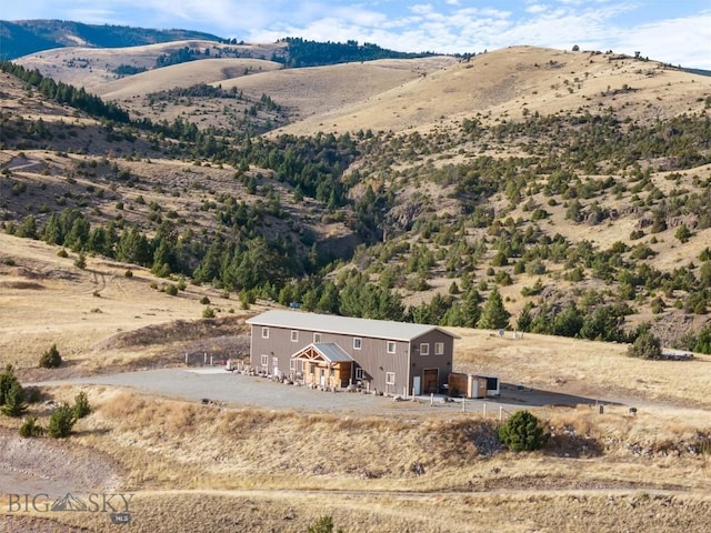 view of mountain feature with a rural view