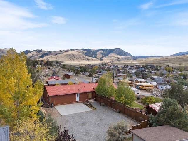 birds eye view of property with a mountain view