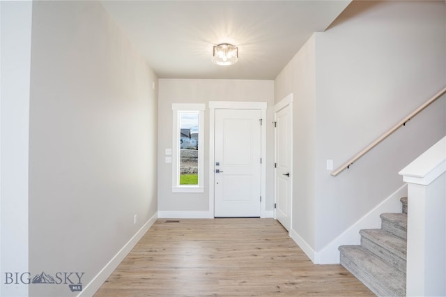 entrance foyer featuring light wood-type flooring