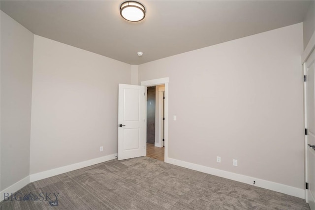 2 Smooth Brome Ct, Three Forks, MT 59752 - empty room with carpet flooring and baseboards