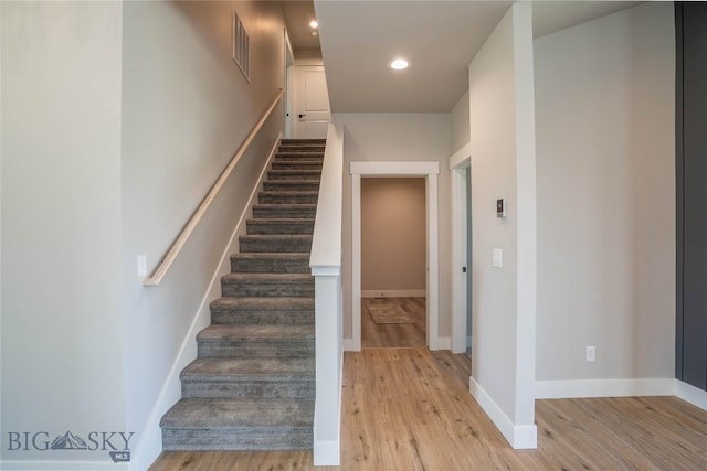 2 Smooth Brome Ct, Three Forks, MT 59752 - staircase with wood finished floors, recessed lighting, and baseboards