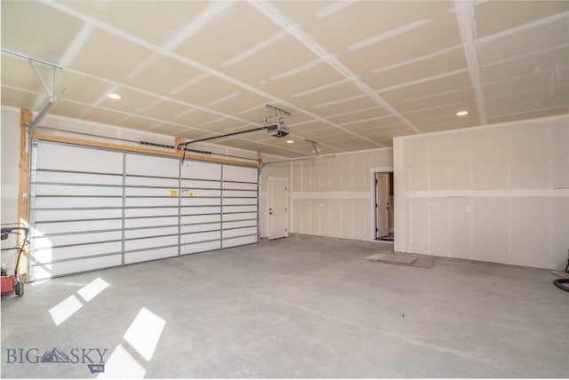 2 Smooth Brome Ct, Three Forks, MT 59752 - garage featuring a garage door opener
