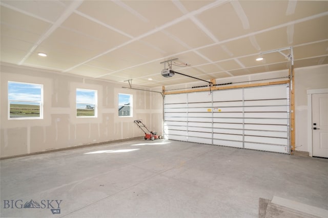 garage featuring a garage door opener