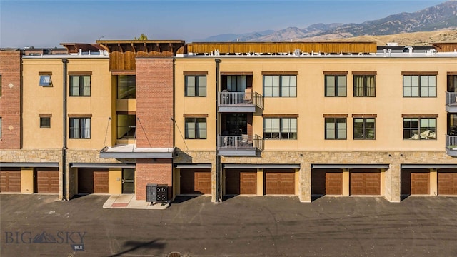 view of building exterior with a mountain view