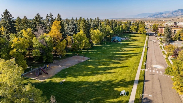 birds eye view of property with a mountain view