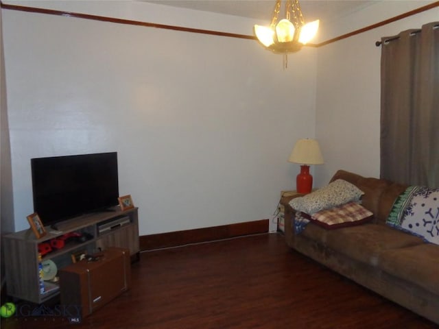 112 Washington St, Anaconda, MT 59711 - living area featuring wood finished floors, baseboards, and a chandelier