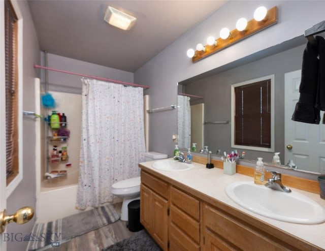 97 Ghost Canyon Ct, Belgrade, MT 59714 - full bath with toilet, double vanity, a sink, and shower / tub combo with curtain