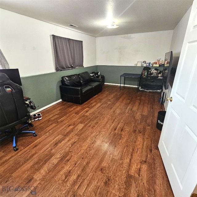 97 Ghost Canyon Ct, Belgrade, MT 59714 - office area with dark wood-style flooring, visible vents, and baseboards