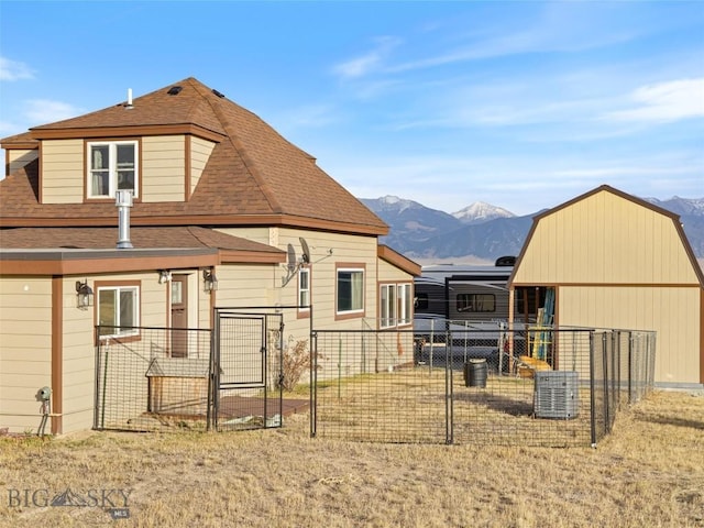 193 Tobe Rd, Ennis, MT 59729 - back of property featuring a mountain view and a shingled roof